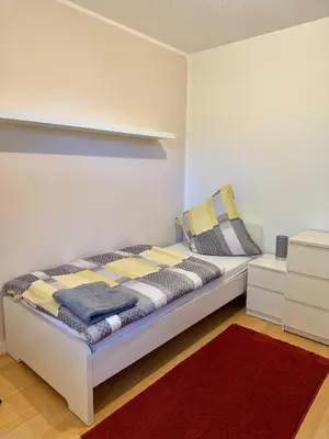 Ein Bett oder Betten in einem Zimmer der Unterkunft Bergjuwel mit Ruhe & Komfort - M20 - Frankenwald Apartments