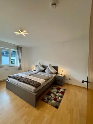 Ein Bett oder Betten in einem Zimmer der Unterkunft Stilvolle Erholungsoase am Berg, Ruhig & modern - Elli M18 - Frankenwald Apartments