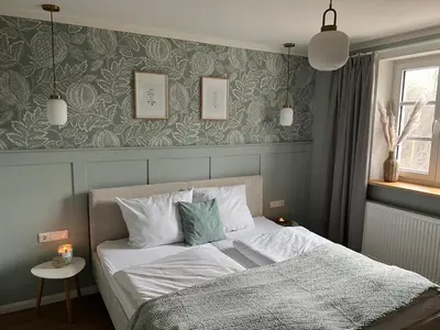 Ein Bett oder Betten in einem Zimmer der Unterkunft Kleine Auszeit Ahorntal