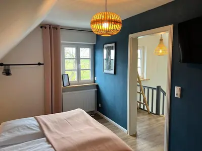 Ein Bett oder Betten in einem Zimmer der Unterkunft Kleine Auszeit Ahorntal