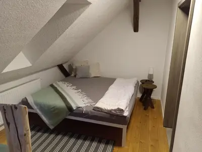 Ein Bett oder Betten in einem Zimmer der Unterkunft Ferienhaus hERZgebirge