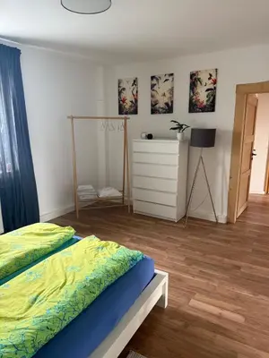 Ein Bett oder Betten in einem Zimmer der Unterkunft Beautiful, renovated, private apartment above bakery