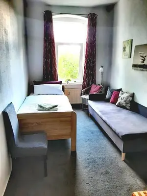 Ein Bett oder Betten in einem Zimmer der Unterkunft 4RELAX - Praktisch und bequem, 4 Betten, zwei Zimmer