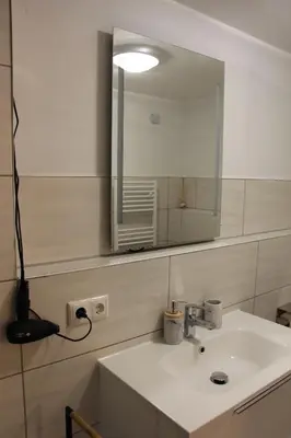 Ein Badezimmer in der Unterkunft Laxmi-Haus Ferienwohnung Bayreuth