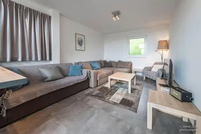 Ein Sitzbereich in der Unterkunft Ferienhaus Sanddornweg 09 an der Therme Obernsees