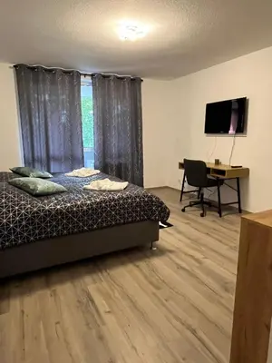 Ein Bett oder Betten in einem Zimmer der Unterkunft Hölderlin Apartment