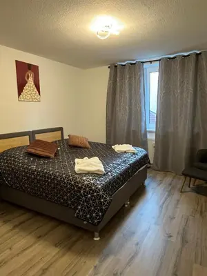 Ein Bett oder Betten in einem Zimmer der Unterkunft Hölderlin Apartment
