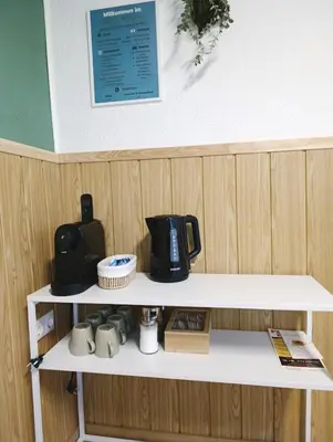 Kaffee-/Teezubehör in der Unterkunft Suite 13 Natur grün mit 2 Zimmer