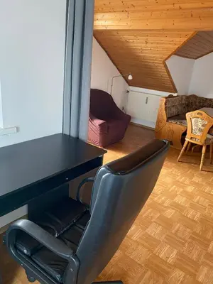 Ein Sitzbereich in der Unterkunft Dachgeschosswohnung im zweiten Obergeschoss