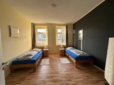 Ein Bett oder Betten in einem Zimmer der Unterkunft Schöne 3 Schlafzimmer Wohnung Philipp1