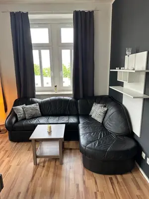 Ein Sitzbereich in der Unterkunft Schöne 3 Schlafzimmer Wohnung Philipp1