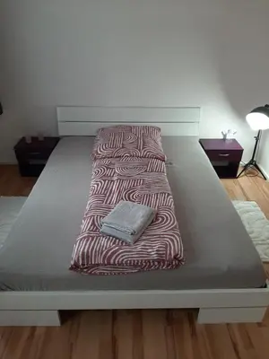 Ein Bett oder Betten in einem Zimmer der Unterkunft Schöne 3 Schlafzimmer Wohnung Philipp1