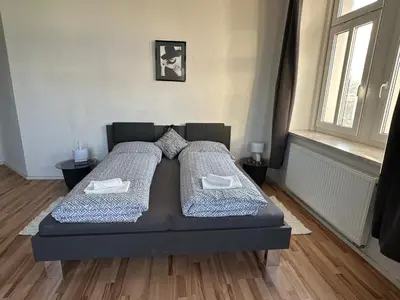 Ein Bett oder Betten in einem Zimmer der Unterkunft Schöne 3 Schlafzimmer Wohnung Philipp1