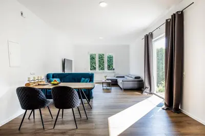 Ein Sitzbereich in der Unterkunft Modernes Apartment in Mistelgau 2