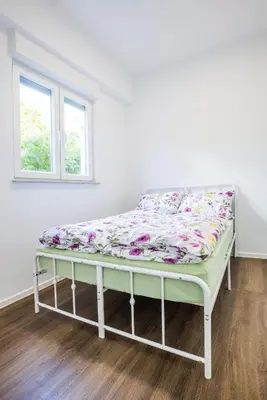 Ein Bett oder Betten in einem Zimmer der Unterkunft Modernes Apartment in Mistelgau 2