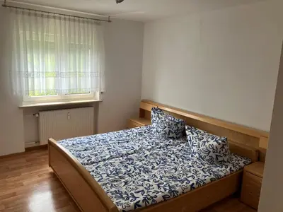 Ein Bett oder Betten in einem Zimmer der Unterkunft Ferienwohnung Cäcilie