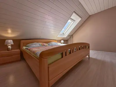 Ein Bett oder Betten in einem Zimmer der Unterkunft Zur Gradlhöhe