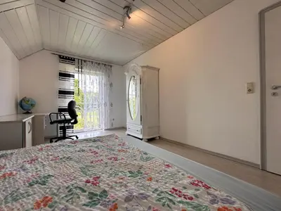 Ein Bett oder Betten in einem Zimmer der Unterkunft Zur Gradlhöhe