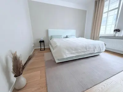 Ein Bett oder Betten in einem Zimmer der Unterkunft designAparts - II - by MorenoPisano