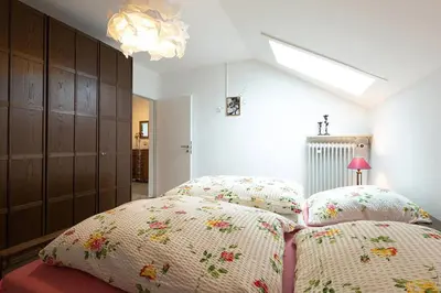 Ein Bett oder Betten in einem Zimmer der Unterkunft Ferienwohnung Spitzbergblick