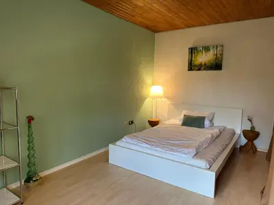 Ein Bett oder Betten in einem Zimmer der Unterkunft Ferienwohnung 