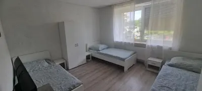 Ein Bett oder Betten in einem Zimmer der Unterkunft Arzberger Monteurapartment