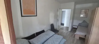 Ein Bett oder Betten in einem Zimmer der Unterkunft Arzberger Monteurapartment