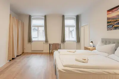 Ein Bett oder Betten in einem Zimmer der Unterkunft City Apartment Zentral in Fußgängerzone, 3 Schlafzimmer, 6 Personen