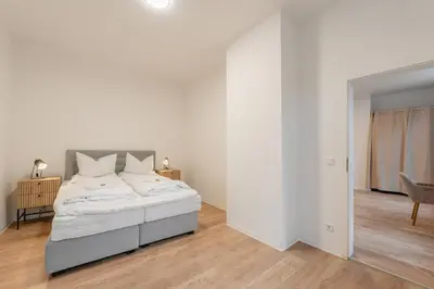 Ein Bett oder Betten in einem Zimmer der Unterkunft City Apartment Zentral in Fußgängerzone, 3 Schlafzimmer, 6 Personen