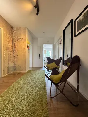 Ein Sitzbereich in der Unterkunft Ferienwohnung Fichtel-STEIN