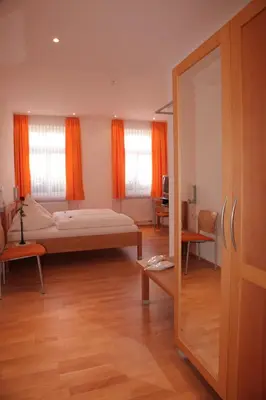 Ein Bett oder Betten in einem Zimmer der Unterkunft Gasthof Hotel Bauer