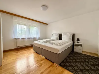 Ein Bett oder Betten in einem Zimmer der Unterkunft Family Apartment Bayreuth Festspielhaus