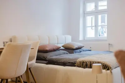Ein Bett oder Betten in einem Zimmer der Unterkunft Stilvolles Wohnen am Ziegeltor - Für Gruppen, Pärchen und Singles