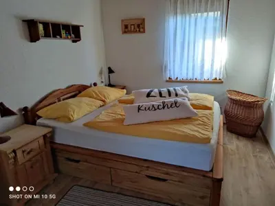 Ein Bett oder Betten in einem Zimmer der Unterkunft Haus Sonneneck 1