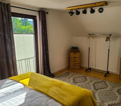 Ein Bett oder Betten in einem Zimmer der Unterkunft Moserhaus Kulmbach - 80 qm eigenes Haus