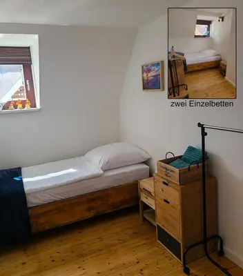 Ein Bett oder Betten in einem Zimmer der Unterkunft Moserhaus Kulmbach - 80 qm eigenes Haus