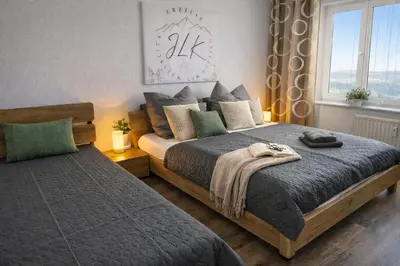 Ein Bett oder Betten in einem Zimmer der Unterkunft ErzZeit Urlaub mit Weitblick