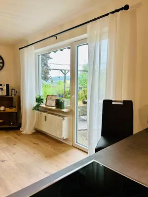 Ein Sitzbereich in der Unterkunft Das Auental-Appartment