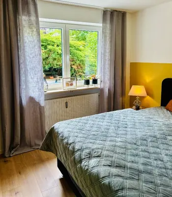 Ein Bett oder Betten in einem Zimmer der Unterkunft Das Auental-Appartment
