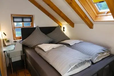 Ein Bett oder Betten in einem Zimmer der Unterkunft Ferienhaus Das Finkennest