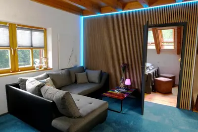 Ein Sitzbereich in der Unterkunft Ferienhaus Das Finkennest