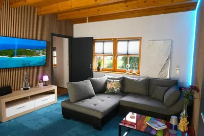 Ein Sitzbereich in der Unterkunft Ferienhaus Das Finkennest