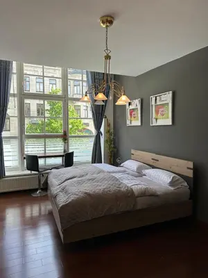 Ein Bett oder Betten in einem Zimmer der Unterkunft Im Herzen Plauen