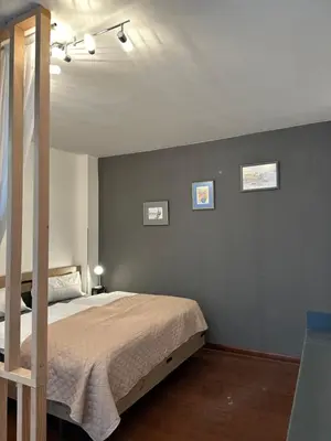 Ein Bett oder Betten in einem Zimmer der Unterkunft Im Herzen Plauen