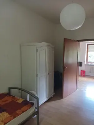Ein Bett oder Betten in einem Zimmer der Unterkunft FEWO Schwunk