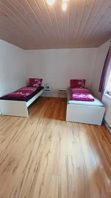 Ein Bett oder Betten in einem Zimmer der Unterkunft Einfache 2 Zimmer Wohnung mit Parkplatz nur 8 Min nach Bayreuth