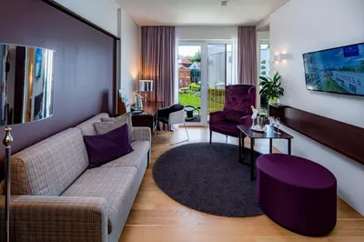 Ein Sitzbereich in der Unterkunft Hotel König Albert