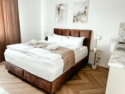 Ein Bett oder Betten in einem Zimmer der Unterkunft Sali Homes - Wahnfried No 6