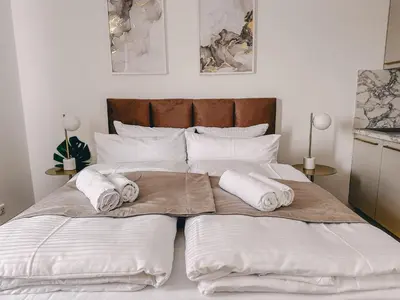 Ein Bett oder Betten in einem Zimmer der Unterkunft Sali Homes - Wahnfried No 6