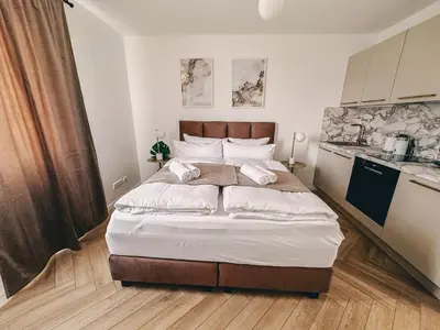 Ein Bett oder Betten in einem Zimmer der Unterkunft Sali Homes - Wahnfried No 6